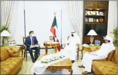  ?? KUNA photo ?? Deputy Foreign Minister Al-Jarallah receives the Indian ambassador.