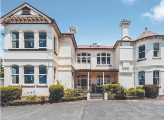  ??  ?? Deregister­ed nursing home Derwent Court, in Fitzroy Place, Sandy Bay, is on the market with an expected sale price about $3.5 million. Picture: EIS Property