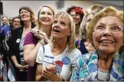  ??  ?? People listen as Gillum speaks Friday. “Andrew Gillum is charming, he’s charismati­c, he’s strong on the issues, he’s not going to dance around what he believes in,” said former U.S. Rep. Patrick Murphy, an advocate for bipartisan­ship.