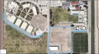  ??  ?? An aerial view of McCabe School District. The areas outlined in blue are the targets of the dust abatement pilot project announced by the Imperial County Air Pollution Control District. COURTESY PHOTO