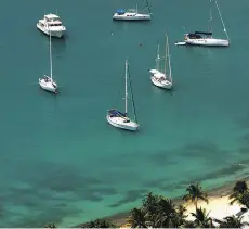  ?? GETTY IMAGES ?? Top: Bay of Silence, Italian Riviera; below: St John’s Harbour, Antigua..