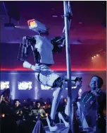  ??  ?? Pole-dancing robot built by Giles Walker.