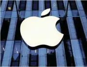  ?? /Reuters ?? Less control: The iPhone maker and other tech giants have to comply with a list of conditions aimed at reining in their power.