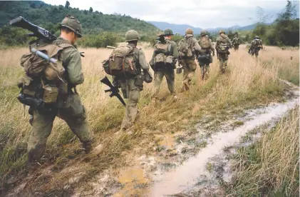  ?? BETTMANN/GETTY IMAGES VIA PBS ?? Soldiers on a search and destroy operation near Qui Nhon, Jan. 17, 1967.