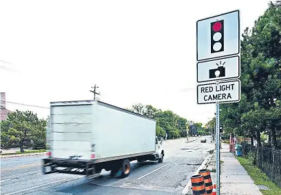  ?? KEITH BEATY/TORONTO STAR FILE PHOTO ?? Toronto’s increased number of red light cameras resulted in more than 60,000 charges being laid against drivers in 2017.
