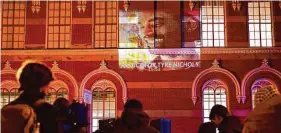  ?? Carolyn Kaster/Associated Press ?? An image of Tyre Nichols, who died after being beaten by Memphis police officers on Jan. 7, is projected on a building Friday night in Washington as people gather to protest his death.