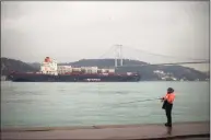  ?? Associated Press ?? Cargo ship Oakland crosses the Bosphorus strait in Istanbul on Tuesday, heading towards the Marmara sea after departing from Russia's Novorossiy­sk port.