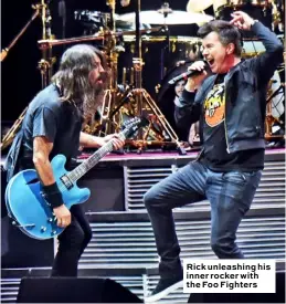  ??  ?? Rick unleashing his inner rocker with the Foo Fighters