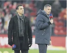  ??  ?? 0 Gary Neville and Jamie Carragher applauded the aims of the protesters after the game at Old Trafford was postponed