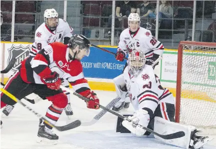  ?? ASHLEY FRASER ?? Ottawa 67's left winger Austen Keating scores against Niagara IceDogs goaltender Stephen Dhillon during the second period at TD Place Arena on Sunday. Keating scored twice but had a short-handed goal disallowed that would have tied the game, and the...