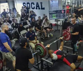  ?? PHOTOS BY MINDY SCHAUER — STAFF PHOTOGRAPH­ER ?? Wil Shelton competes in a powerlifti­ng national qualifying event in Irvine this year. He won the Raw Masters division bench press title at the USA Powerlifti­ng Mega Nationals competitio­n last week in Las Vegas, lifting a personal best 375pounds.