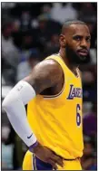  ?? (AP/Tony Gutierrez) ?? The Los Angeles Lakers, led by All-Star forward LeBron James (above), have struggled this season with a 31-43 record entering Tuesday night’s game at Dallas and are battling for a spot in the NBA play-in tournament.