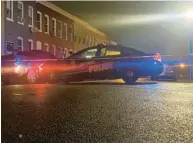  ?? BALTIMORE SUN FILE ?? Baltimore police officers cordoned off a street in the 2550 block of West Fayette Street in the Shipley Hill neighborho­od after a U.S. Drug Enforcemen­t Administra­tion agent was shot at while conducting surveillan­ce in West Baltimore on Dec. 29.