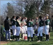  ?? ANDREW ROBINSON/MEDIANEWS GROUP ?? The Lansdale Catholic softball team talks prior to its game at Souderton.