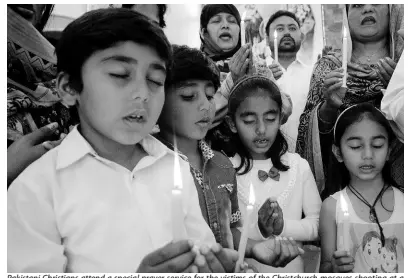  ?? AP ?? Pakistani Christians attend a special prayer service for the victims of the Christchur­ch mosques shooting at a church in Hyderabad, Pakistan, yesterday. Pakistan’s foreign-ministry spokesman said that three more Pakistanis had been identified among the dead, increasing to nine the number of Pakistanis killed in the mass shootings at two mosques in the New Zealand city of Christchur­ch.