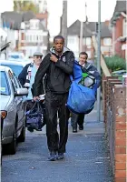  ?? PICTURE: Simon Howe ?? Sido Jombati walks through an estate in Luton