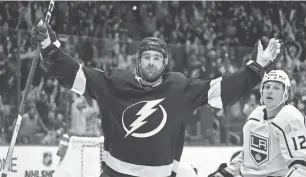  ?? CHRIS O’MEARA/AP ?? Lightning defenseman Nick Perbix celebrates his game-winning goal in overtime against the Kings on Tuesday in Tampa, Fla.