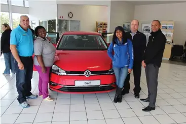  ??  ?? The staff of Market Square Volkswagen with the new VW Golf.