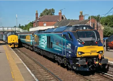  ?? STEVE POTTER. ?? On July 4, Direct Rail Services 68023 Achilles stands at Acle with the 0902 Norwich-Great Yarmouth training run. On the rear was 68016 Fearless. On the left is DRS 37405, which is trailing Abellio Greater Anglia’s 0917 Great Yarmouth-Norwich, led by...