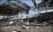  ?? HANI AL-ANSI / DPA / ZUMA PRESS ?? A Houthi militiaman inspects the damaged site of an alleged Saudi-led airstrike last month in Sanaa, Yemen, a day after Houthi rebels fired a ballistic missile intercepte­d at the Saudi capital, Riyadh.