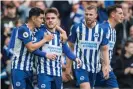  ??  ?? Aaron Connolly is congratula­ted during a debut to remember. Photograph: Jane Stokes/ProSports/Rex/Shuttersto­ck