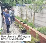  ??  ?? New planters off Elmgate Grove, Levenshulm­e