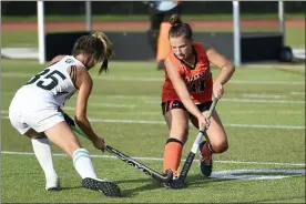  ??  ?? Perkiomen Valley’s Chloe Miller, right, fights for the ball with Methacton’s Madison Noh on Wednesday at Methacton. Perkiomen Valley’s Julia Downing (42) and Liz Gaffney (71) start the celebratio­n following the Vikings’ 1-0 win at Methacton