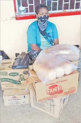  ?? Picture: VILIAME RAVAI ?? Koini Talei Naiobasali with her groceries at Sawani.