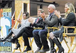  ?? Susan Montoya Bryan ?? The Associated Press From left, New Mexico Gov. Susana Martinez, Albuquerqu­e Mayor Tim Keller, Netflix vice president for physical production Ty Warren and Albuquerqu­e film liaison Alicia Keyes headline a news conference Monday at ABQ Studios in Albuquerqu­e, N.M.