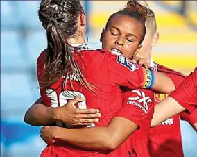  ?? GETTY IMAGES ?? Head girl: Parris (right) celebrates her winning goal