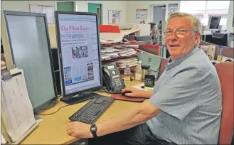  ??  ?? The longest serving member of staff at The Oban Times, Davie Buchanan, was given the privilege of outputting the very last front page of the newspaper in its broadsheet format. Davie, who has worked for The Oban Times for 53 years, said he would find...