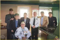  ?? Photos by John Riedy/The Greatest Generation­s Foundation ?? (Top) World War II veterans on Queen Mary 2 stage. (Center) Jackie Chase with WWII veteran Alexander Horanzy. (Above) Queen Mary 2 captain with veterans.