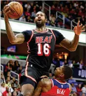  ?? ROB CARR / GETTY IMAGES ?? Forward James Johnson says the Heat’s inconsiste­ncy is mind-boggling. “We shouldn’t be in these predicamen­ts or this position, but we are,” he said.