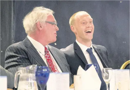  ??  ?? Guest speakers Cambuslang Rotary Club’s top table guests were former Dunfermlin­e Athletic manager Jim Leishman (left) and Eric Davidson