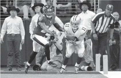  ?? KARL MERTON FERRON/BALTIMORE SUN PHOTOS ?? Cowboys wide receiver Cole Beasley beats Ravens cornerback Jerraud Powers for a touchdown catch in the second quarter.