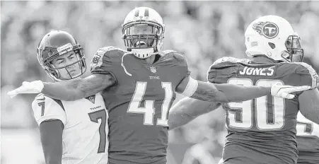  ?? Brett Coomer photos / Houston Chronicle ?? Titans defensive back Brynden Trawick (41) signals “no good” after Texans kicker Ka’imi Fairbairn (7) missed on a field-goal attempt during the second quarter Sunday at Nissan Stadium in Nashville. Fairbairn connected on two of four field-goal tries.