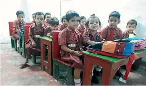  ??  ?? A Class at the Delhi school Gauer set up after discussion with his exheadmast­er father about poor families being unable to afford schooling.