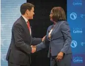  ?? THE PALM BEACH POST ?? Incumbent Republican Sen. Marco Rubio and U.S. Rep. Val Demings, his Democratic opponent, greet each other before a televised debate on Oct. 18.