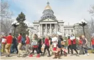  ?? Photos by RJ Sangosti, The Denver Post ?? Hundreds of educators rallied Monday in downtown Denver.