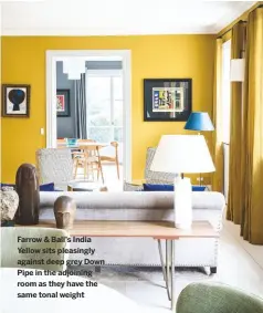  ??  ?? Farrow & Ball’s India Yellow sits pleasingly against deep grey Down Pipe in the adjoining room as they have the same tonal weight