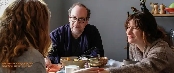  ??  ?? Paul Giamatti, Kathryn Hahn, and Kayli Carter star in ‘Private Life’