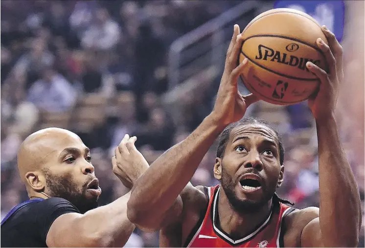  ?? FRANK GUNN/THE CANADIAN PRESS ?? Toronto coach Nick Nurse says forward Kawhi Leonard, right, has made an indelible impression so far this season with his talent and his hustle. The Raptors take a 5-0 mark into their game Friday against the Dallas Mavericks.