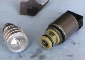  ??  ??  By removing the one 8mm bolt and keeper that holds the EPC Solenoid into the valve body, the solenoid can be popped out of its bore. The billet machined plug supplied by DRP simply slips over the end of the solenoid and can be reinserted into the...