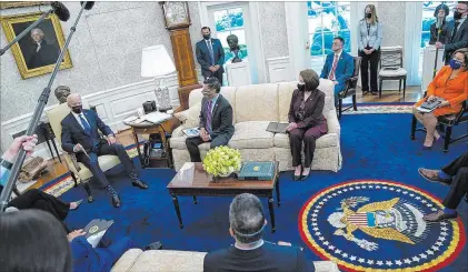  ?? Evan Vucci The Associated Press ?? President Joe Biden speaks Tuesday in the Oval Office at a meeting with members of the Congressio­nal Hispanic Caucus. Rep. Raul Ruiz, D-calif., and Sen. Catherine Cortez Masto, D-nev., participat­ed in the discussion.