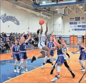  ?? Frank Crowe ?? Gordon Central junior Mercedes Coleman goes for the basket during the Lady Warriors’ game against the Armuchee Lady Indians at Gordon Central High School on Friday, Dec. 13.