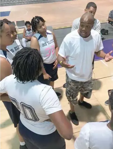  ?? (Submitted photo) ?? Mississipp­i Elite coach John Outlaw instructs his team out in Las Vegas.