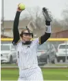  ?? TROY STOLT/ DAILY SOUTHTOWN ?? Andrew’s Clare Hester winds up for a pitch against Providence on March 25.