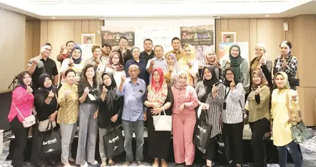  ?? — Photo courtesy of STB ?? The STB team with Sarawak and Samarinda tourism partners during the ‘Sarawak A Journey Awaits’ B2B networking session.