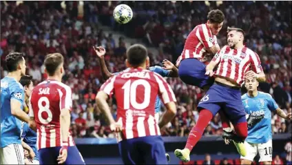  ??  ?? Atletico Madrid’s Hector Herrera scores his side’s 2nd goal during the Champions League Group D soccer match between Atletico Madrid and Juventus at Wanda Metropolit­ano stadium in Madrid, Spain, on Wednesday. AP PHOTO/MANU FERNANDEZ