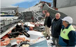  ?? JOHN HAWKINS/STUFF ?? From left, Invercargi­ll city councillor Peter Kett, Southland Indoor Leisure Centre Charitable Trust past chairman Ray Harper and Pepi Pikia of Amalgamate­d Builders inspecting the caved-in roof.